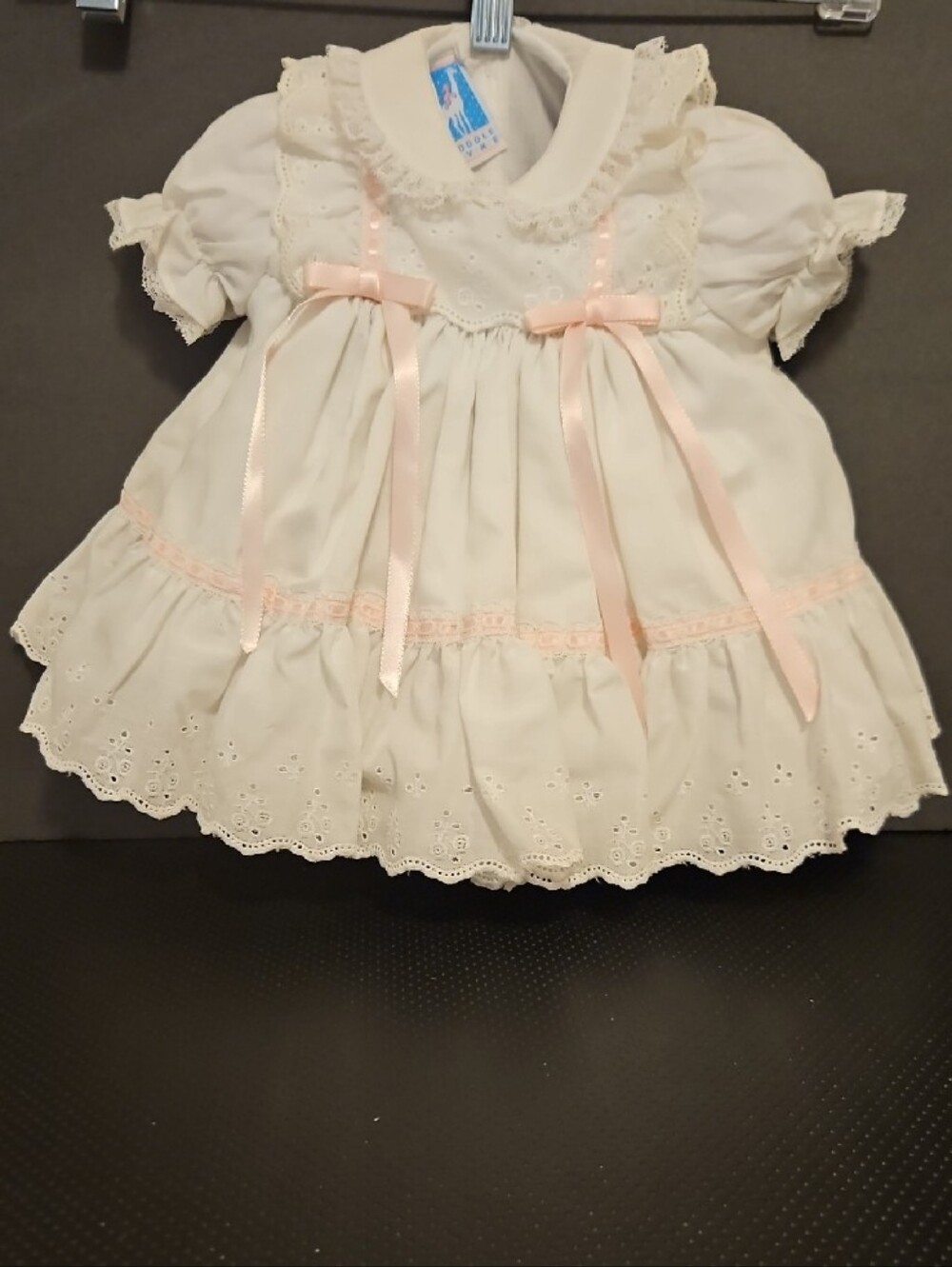 Classic White Eyelet Baby Dress with Pink Ribbon Accents